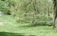 Tent camping by the pond